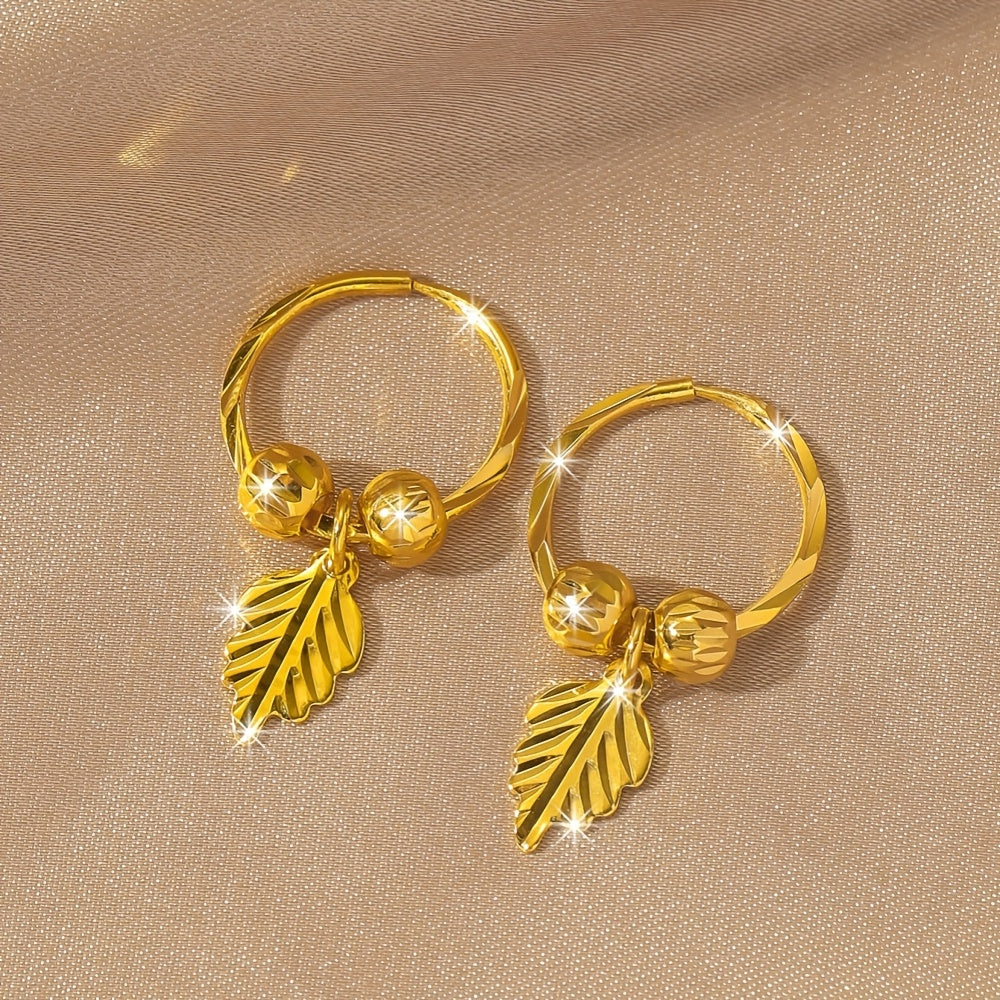 Pair of Gold-Plated Hollow Star Earrings with Floral Motif & Beads