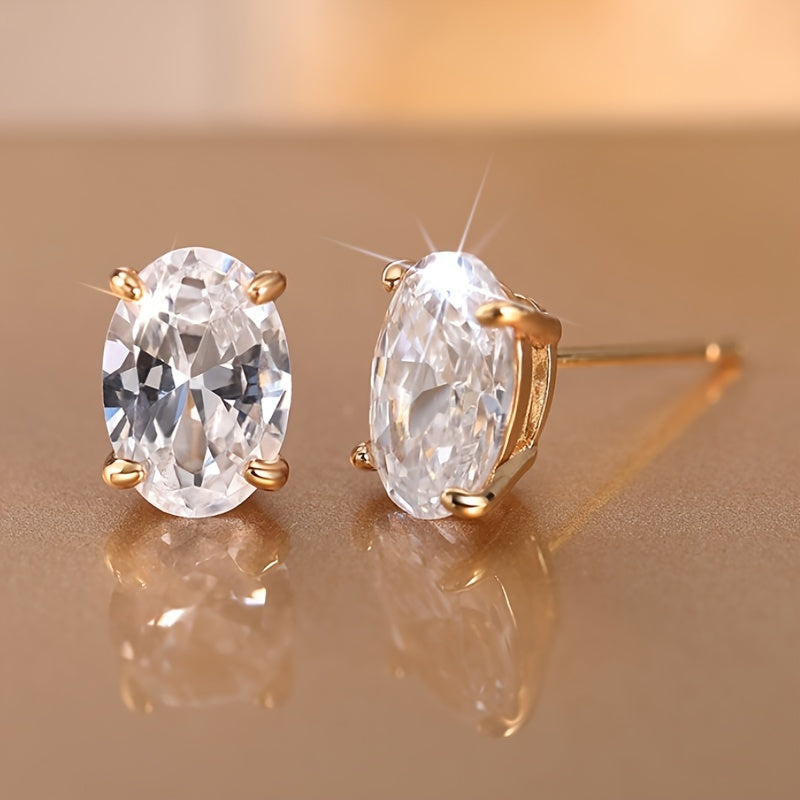 Dainty Oval Synthetic Zirconia – Four-Prong Setting for Subtle Elegance