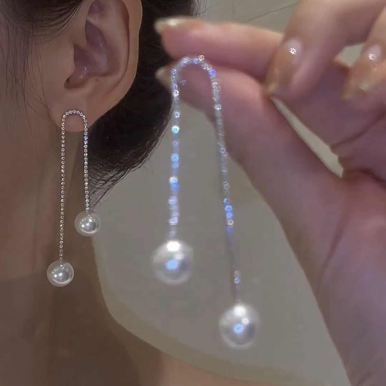 Diamond tassel and pearl earrings
