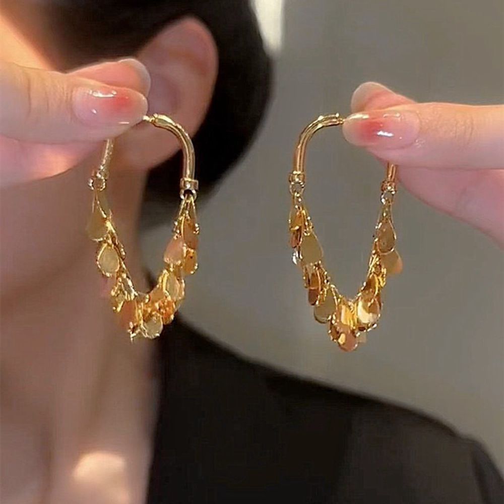 Sequin earrings with tassels