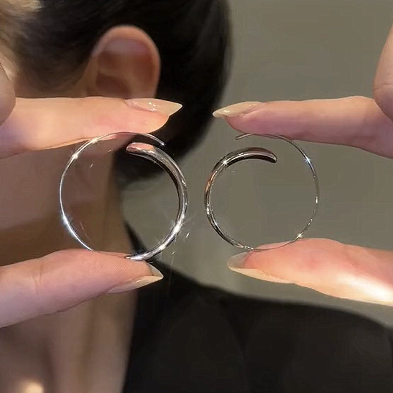 Large curved earrings