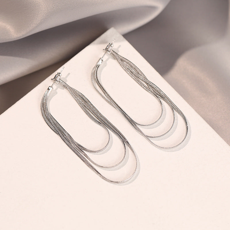 Earrings with soft chain and tassel