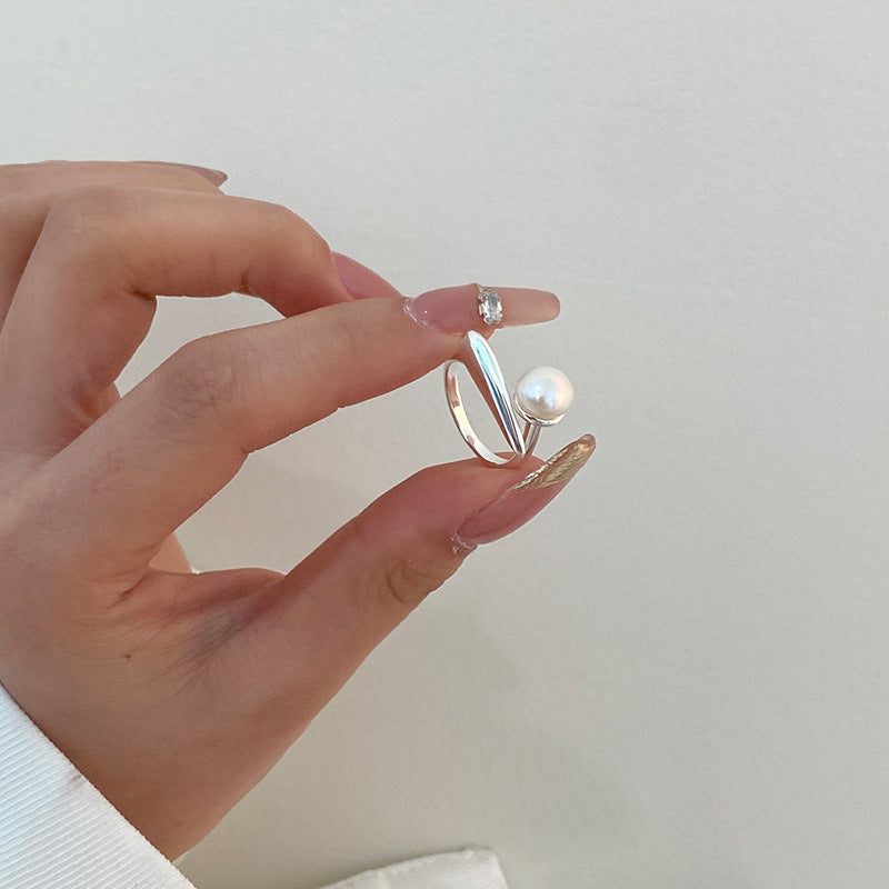 Sterling silver interlocking pearl ring