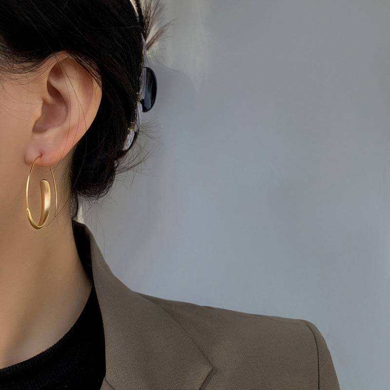 Large curved earrings