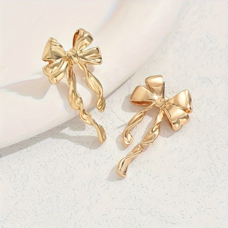 TwinkleTies – Golden Bowknot Stud Duo for Effortless Charm