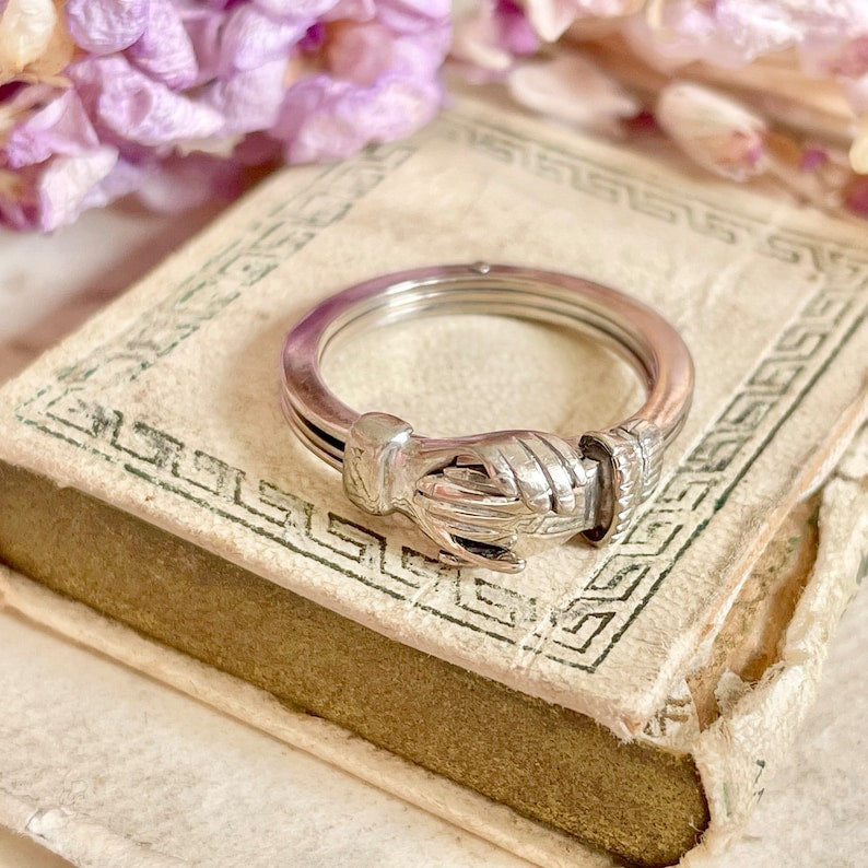 Vintage gimmel feather ring with hidden heart design