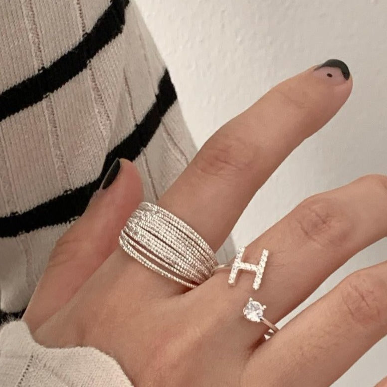 Zirconia letter sterling silver ring