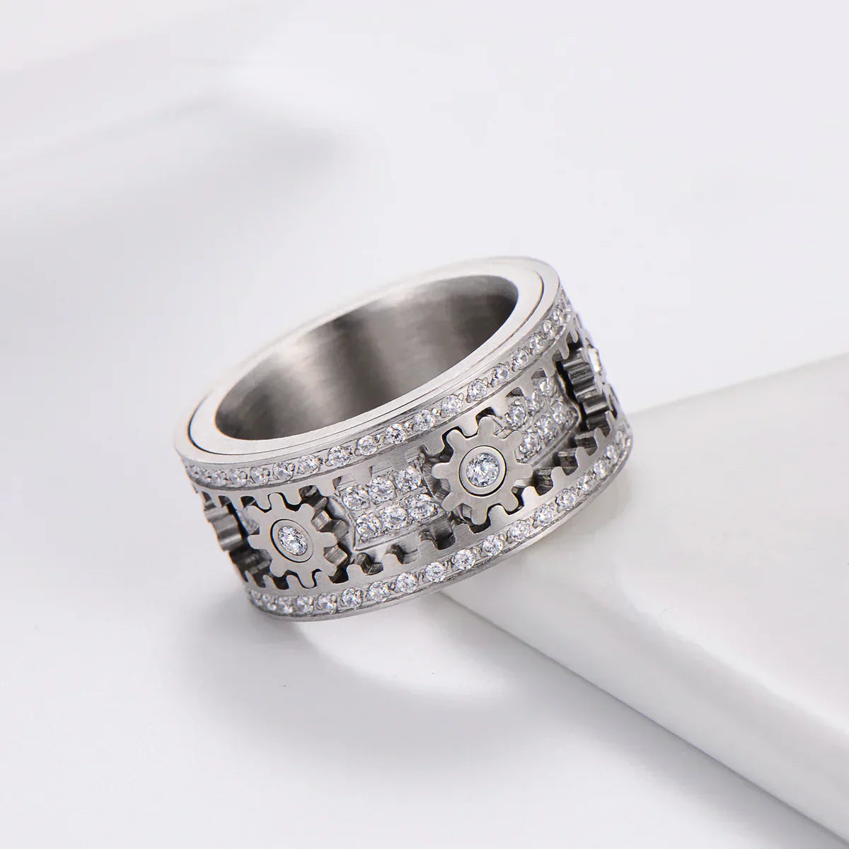 Pair relaxation ring - Fully set with diamonds, rotating gear design
