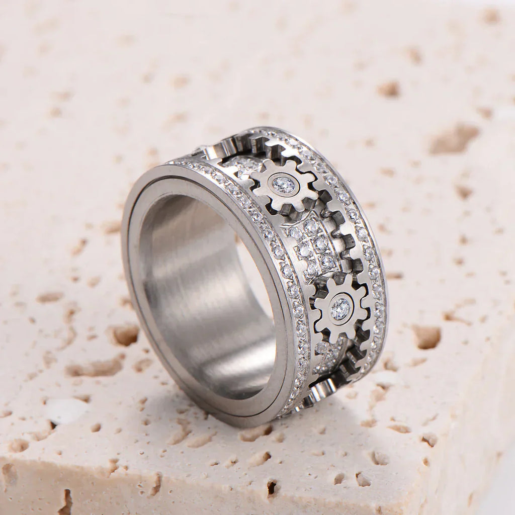Pair relaxation ring - Fully set with diamonds, rotating gear design