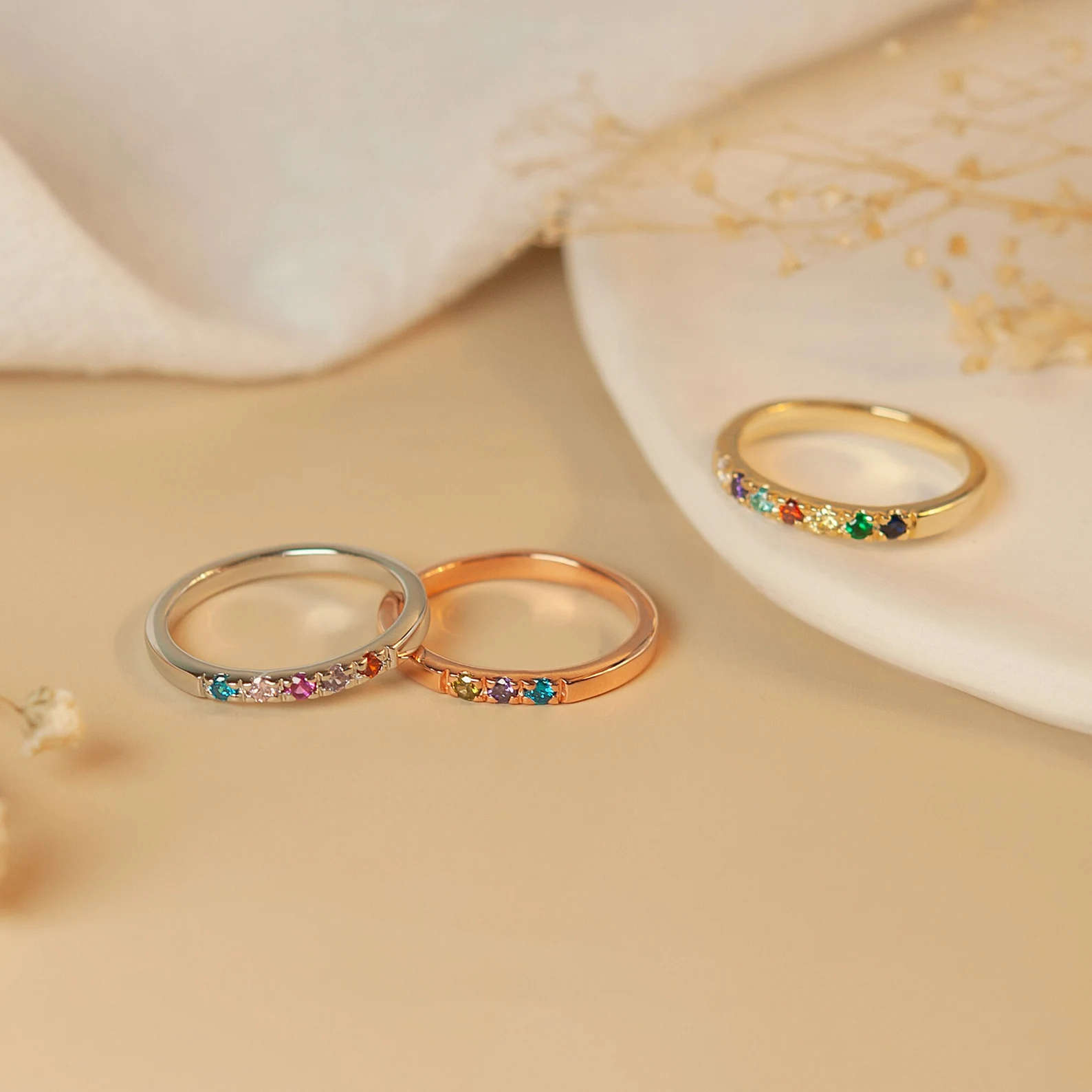 Delicate golden birthstone ring - family jewelry with meaning