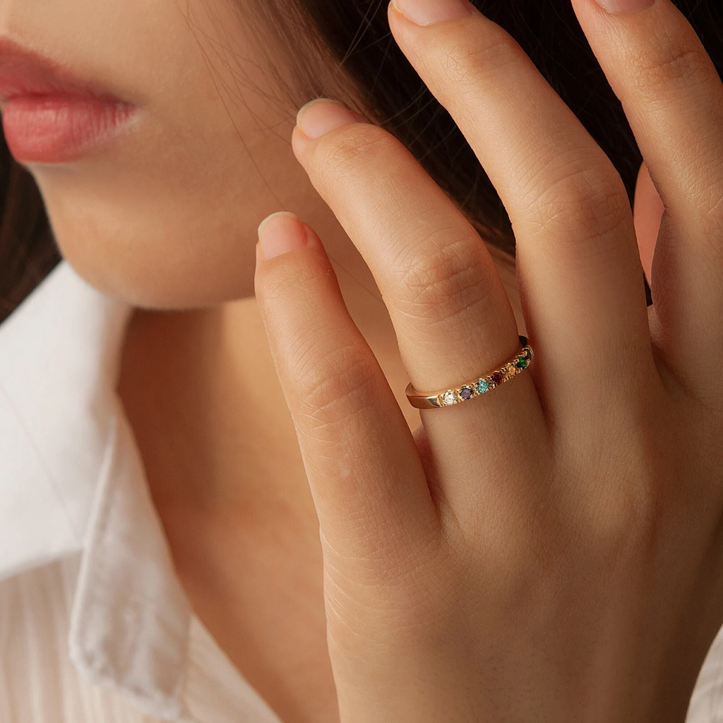 Delicate golden birthstone ring - family jewelry with meaning