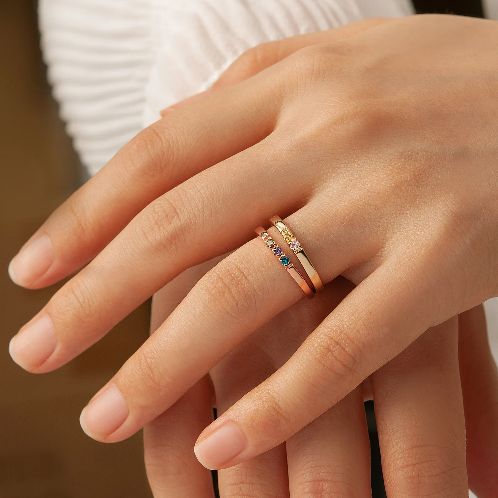 Delicate golden birthstone ring - family jewelry with meaning