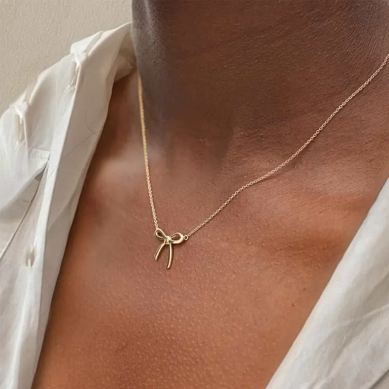 Elegant Gold Bow Necklace – CharmKnot Design with Refined Shine