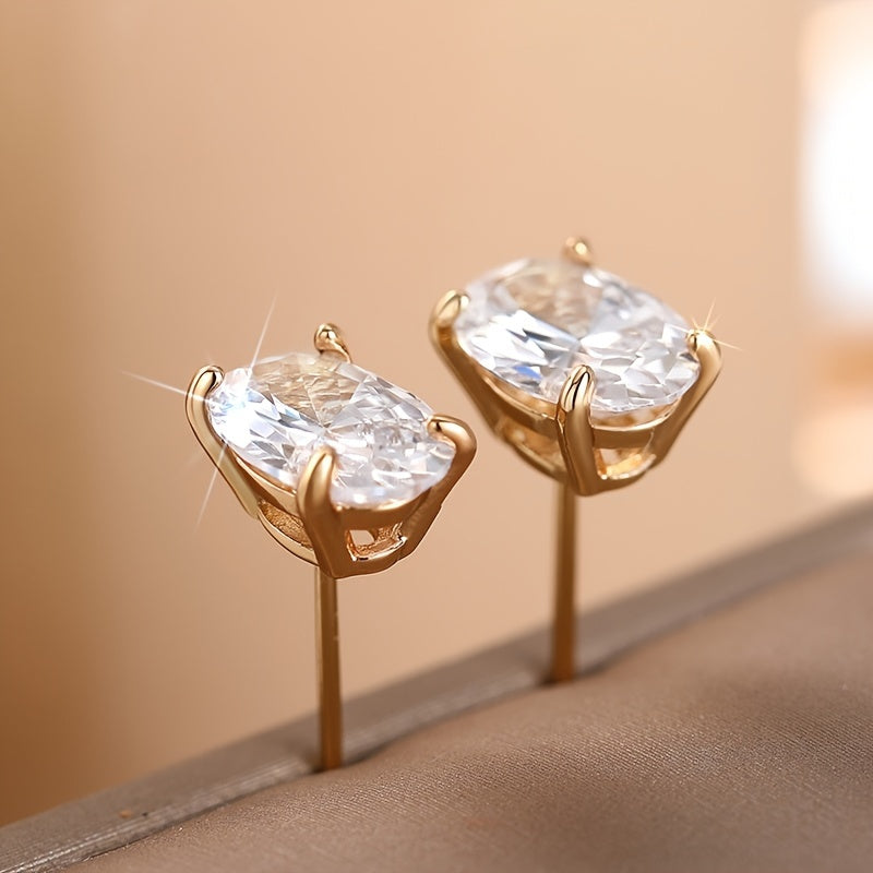 Dainty Oval Synthetic Zirconia – Four-Prong Setting for Subtle Elegance