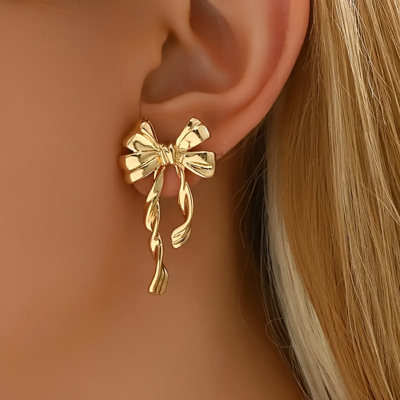 TwinkleTies – Golden Bowknot Stud Duo for Effortless Charm