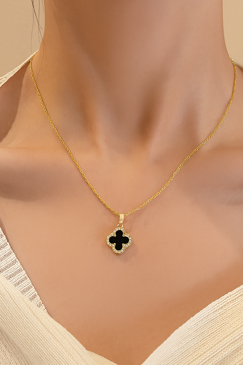 Gold-colored shamrock pendant necklace for women