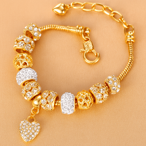 14K gold pearl bracelet with heart pendant