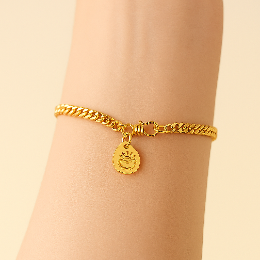 Gold-Tone Cuban Chain Bracelet – Elegant Design with Coin Pendant