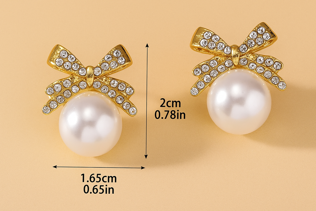 Ornate pearl earrings with bow embellishment