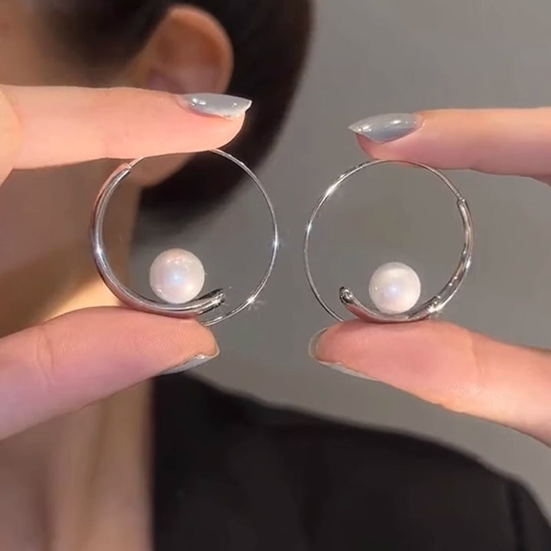Large hoop pearl earrings
