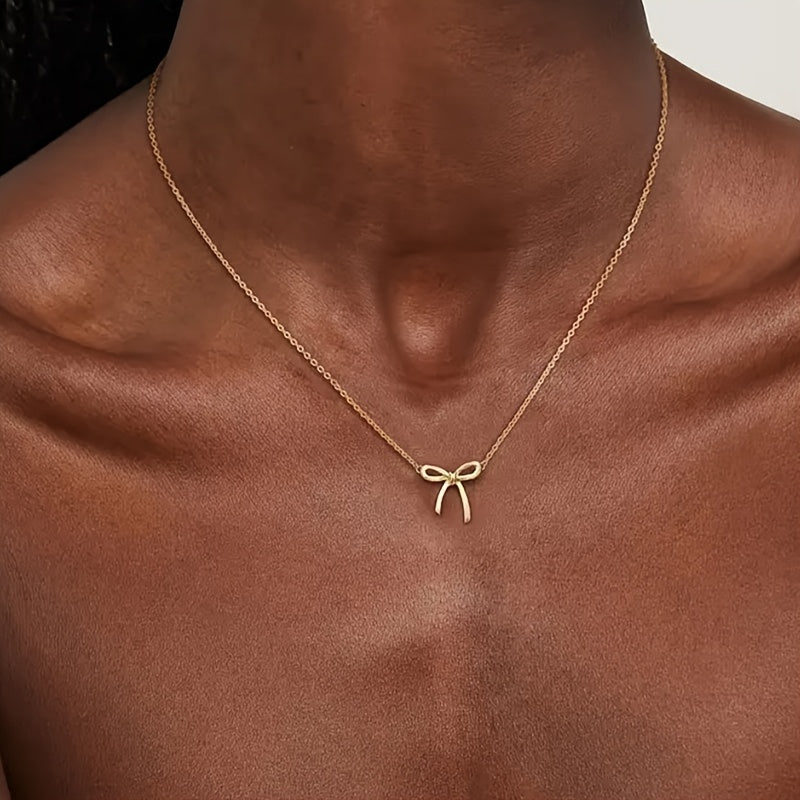 Elegant Gold Bow Necklace – CharmKnot Design with Refined Shine
