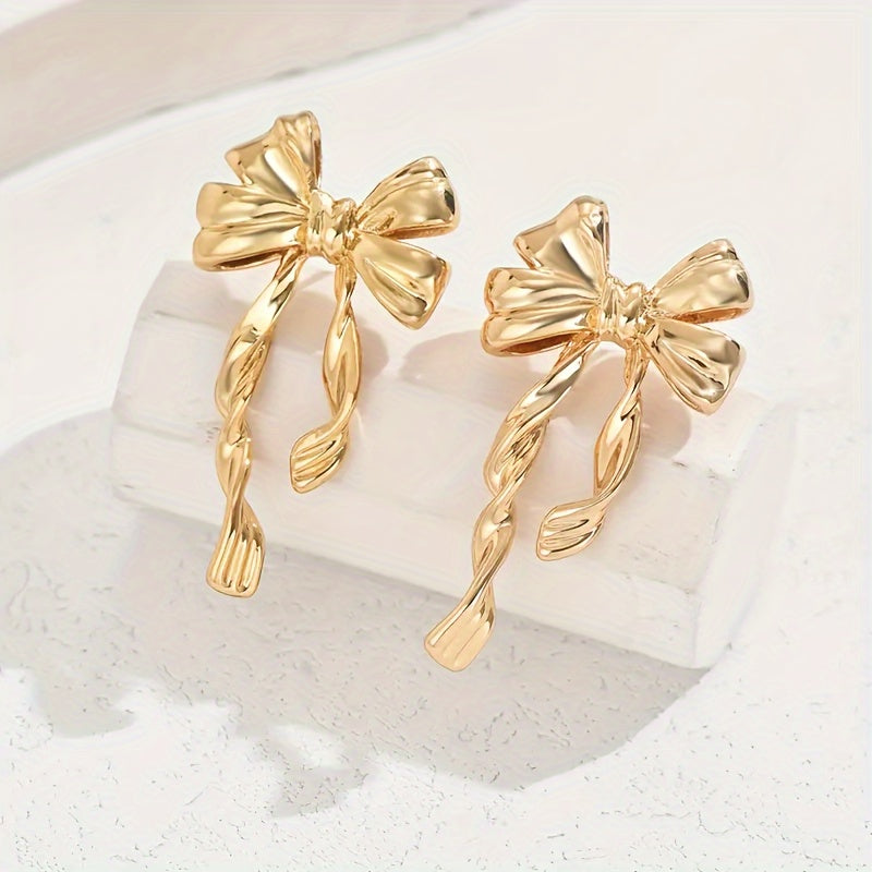 TwinkleTies – Golden Bowknot Stud Duo for Effortless Charm